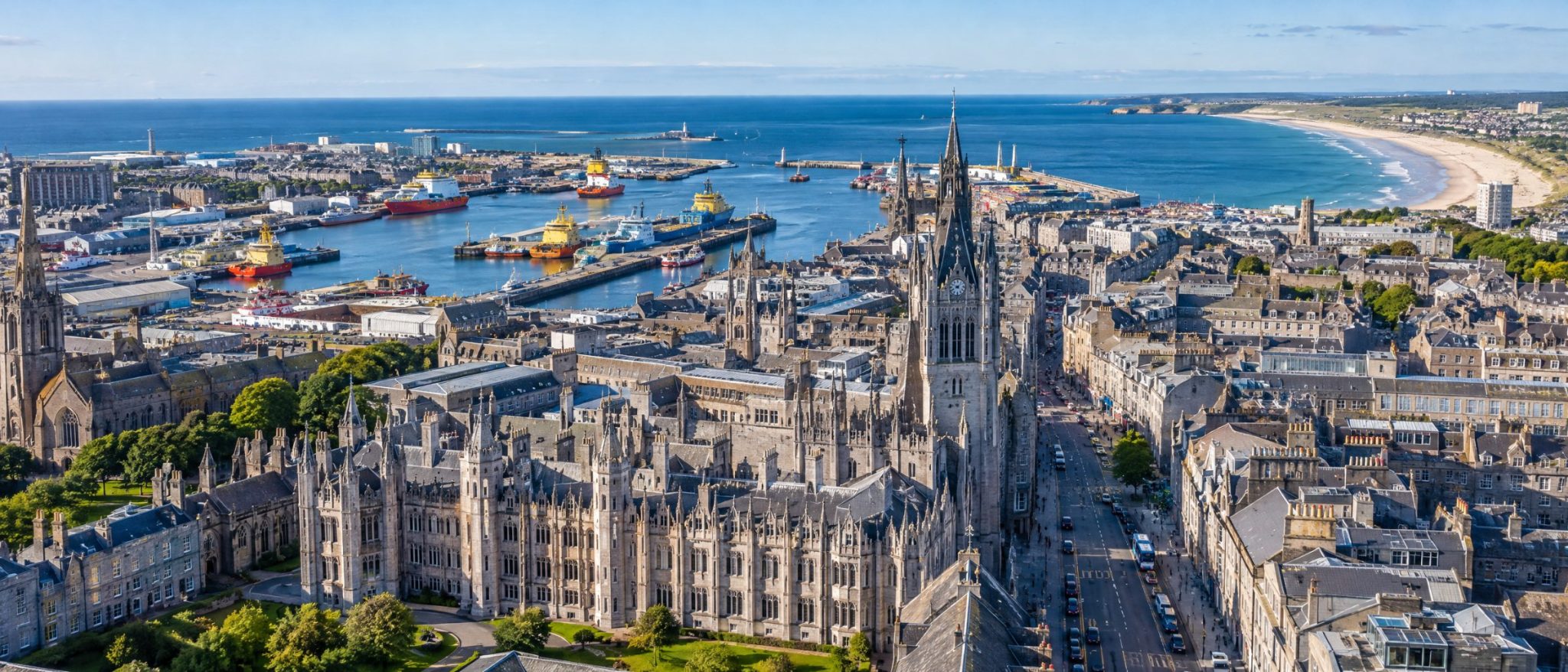 Aerial view of Aberdeen city centre with Marischal College, granite buildings, the harbour and the beach