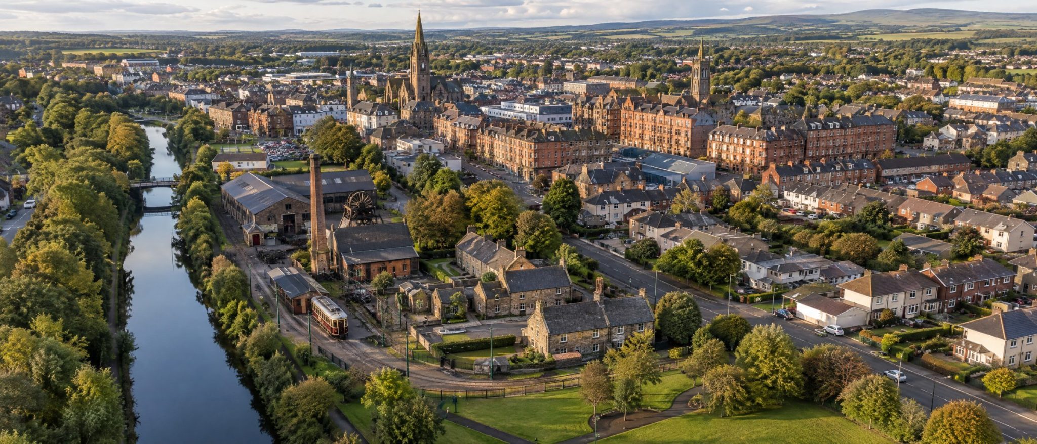 Aerial view of Coatbridge with the canal, sandstone streets and church spires