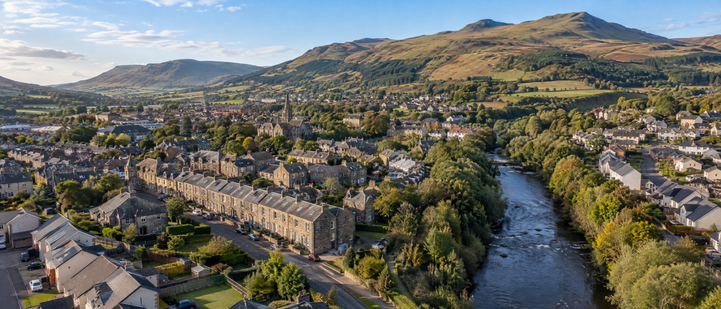 Aerial view of Penicuik with homes and the Pentland Hills behind