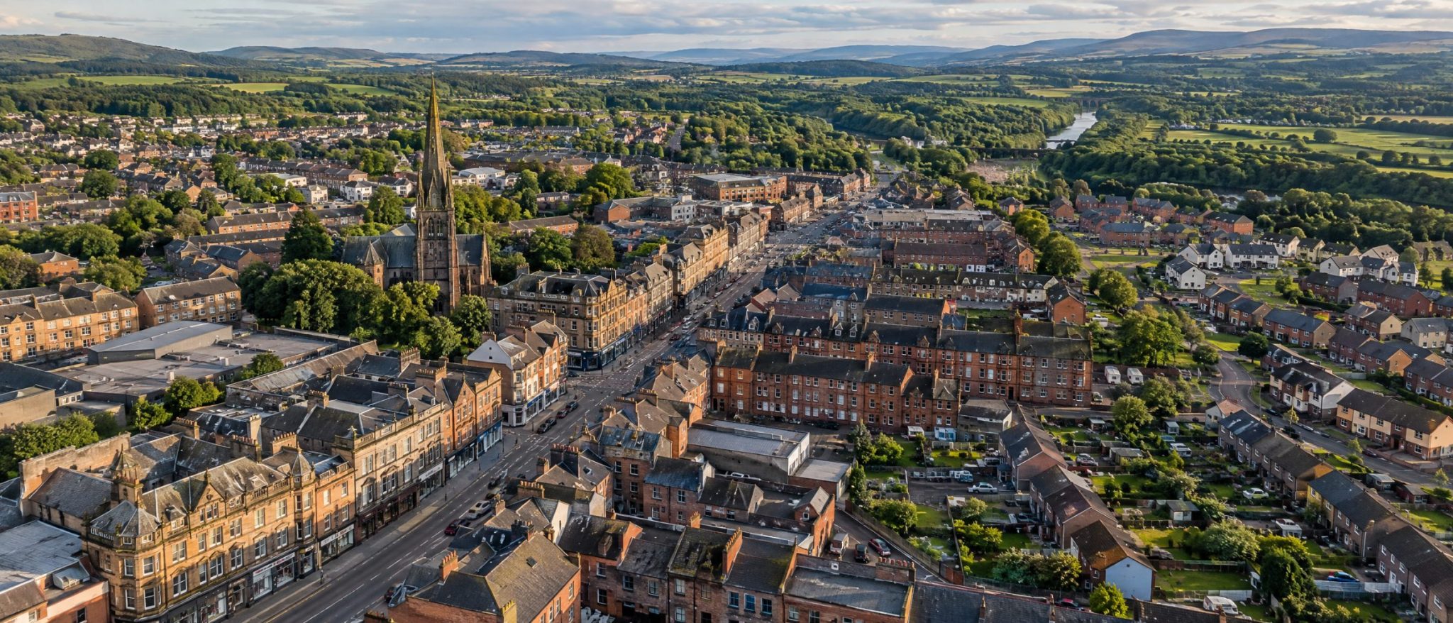 Aerial view of Wishaw Main Street, sandstone tenements and the Clyde Valley
